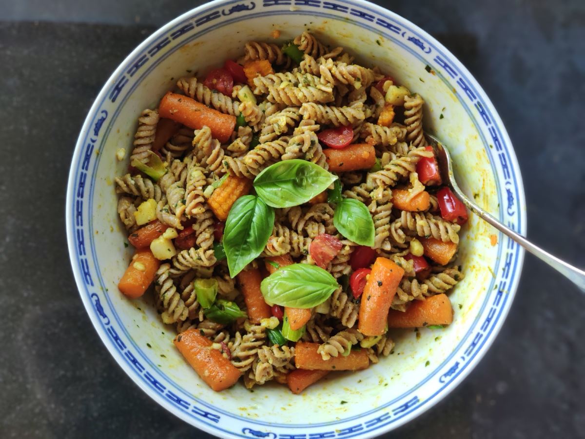 Bowl of pasta salad with roasted vegetables